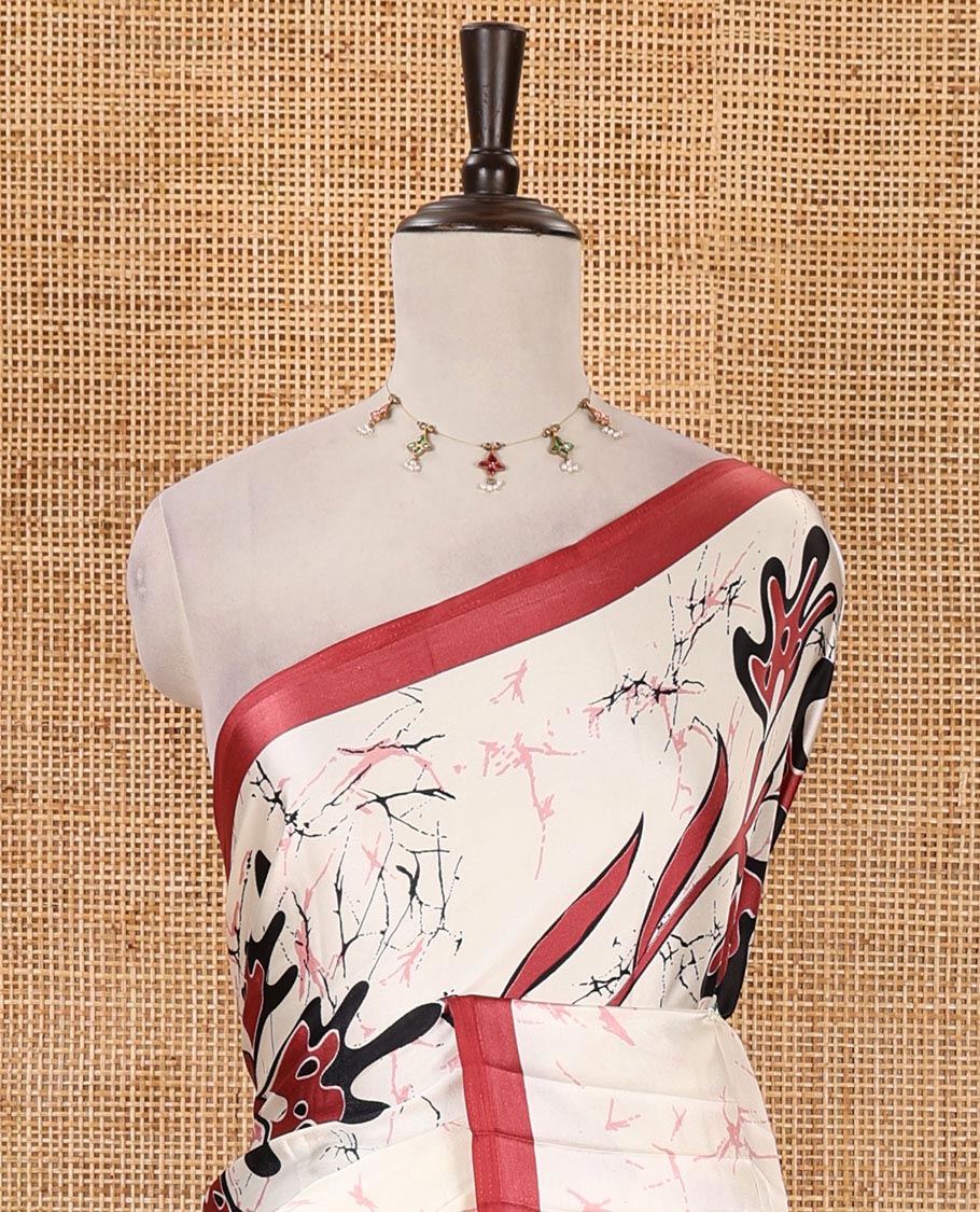 Cream-base batik-style floral printed satin crepe saree, contrast onion pink border, printed pallu & contrast floral printed blouse