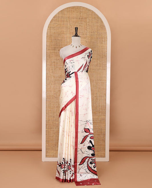 Cream-base batik-style floral printed satin crepe saree, contrast onion pink border, printed pallu & contrast floral printed blouse