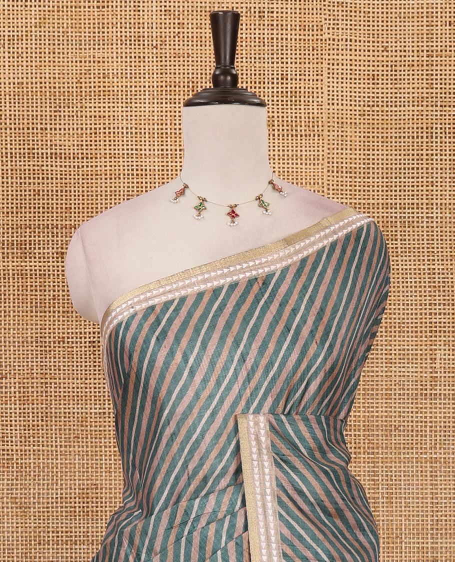 Rama green lehariya-style striped semi-tussar saree, contrast resham thread triangle motifs border, diamond printed pallu & contrast printed blouse