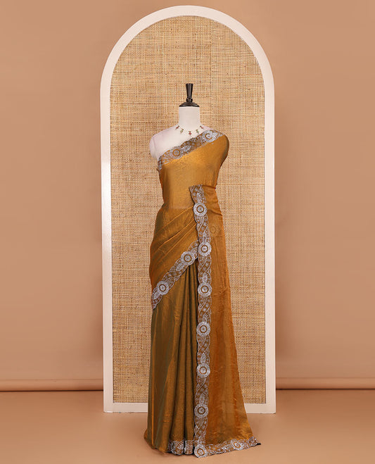 Mustard full-plain fendy chiffon saree, scallop swarovski stone work geometric border and contrast plain blouse