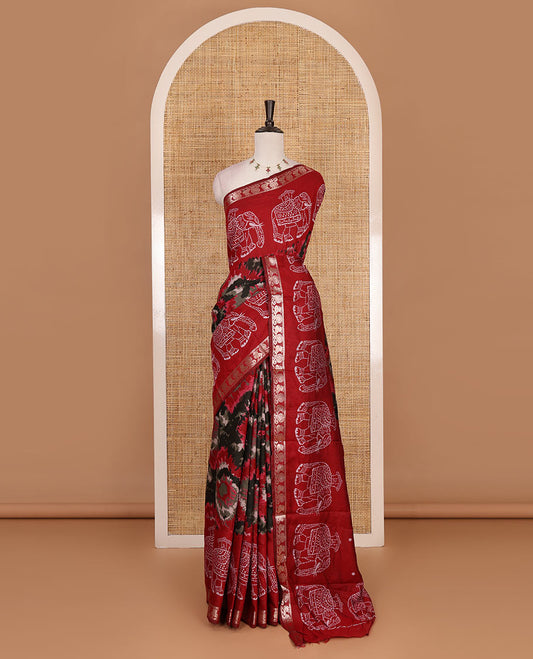 Red-black shibori printed muslin cotton saree, contrast batik elephant print border of zari annam, batik elephant pallu, and contrast polka dots print blouse