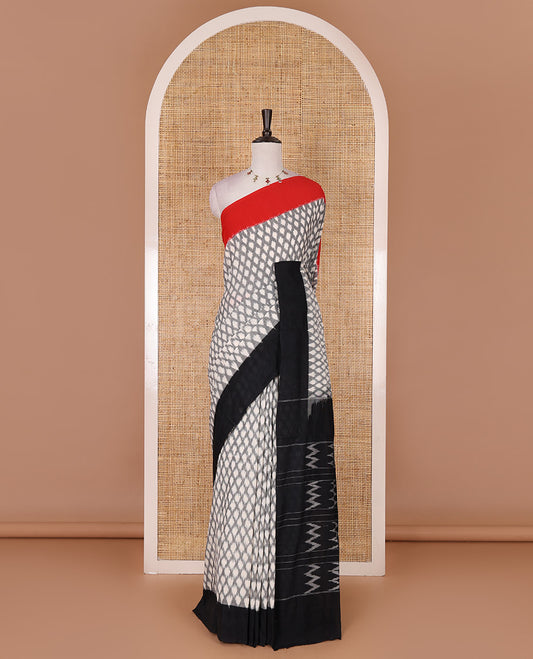 Half white jaal design ikkat cotton saree, contrast plain ganga jamuna border,  ikkat jaal pallu, and contrast plain blouse