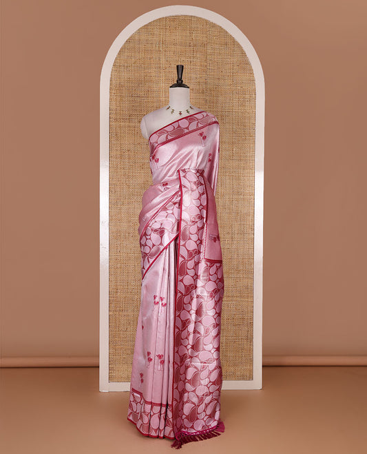 Pink jacquard kanchi silk saree, contrast border, and pallu steeped with paisley motifs with contrast zari design blouse