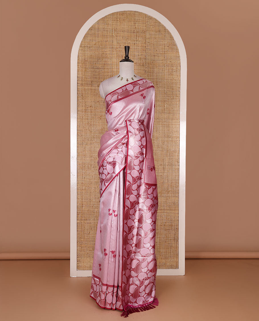 Pink jacquard kanchi silk saree, contrast border, and pallu steeped with paisley motifs with contrast zari design blouse