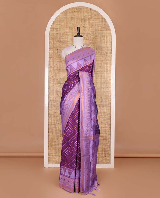 Dark violet ikkat style zari and thread buttas semi-tussar saree, contrast ikkat design border, geometric patterned pallu, and a contrast blouse