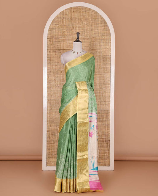Green bandhani dotted trees, and deer motifs printed dola silk saree, contrast zari border, pallu of tree, and deer print, and contrast zari design blouse