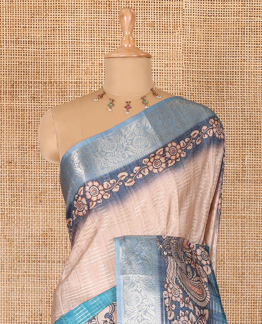 Blue tri-ombre colored zari stripes, and kalamkari peacock printed semi-tussar saree, contrast floral creeper zari border, peacock printed pallu, and a contrast blouse of zari and print work