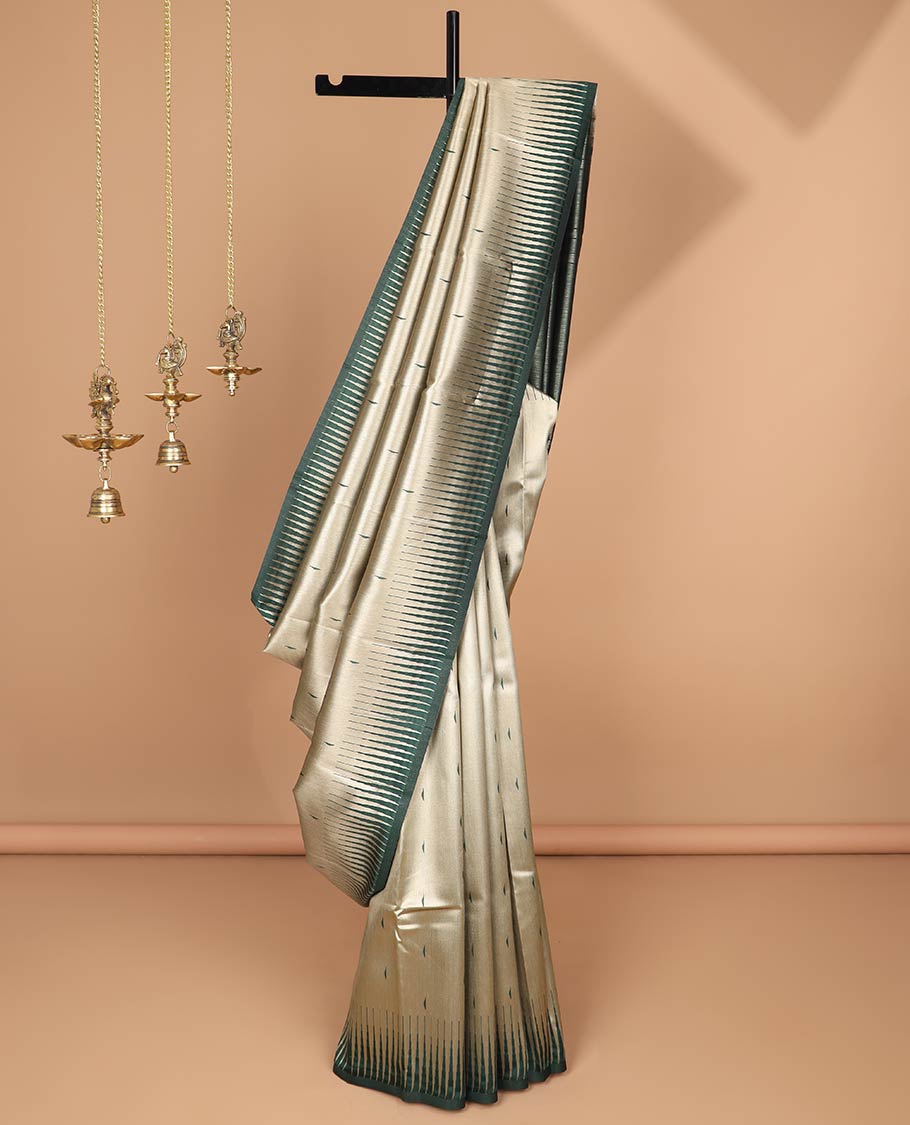 Gold with green color gold zari brocade, thread butta design banaras tissue saree with contrast temple border & lining chit pallu along with plain blouse