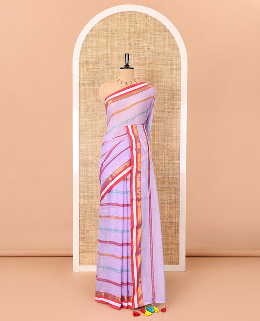 Lavender horizontal multi-colored striped Khadi mul cotton saree, contrast satin gold zari piping border, striped pallu, and a matching blouse