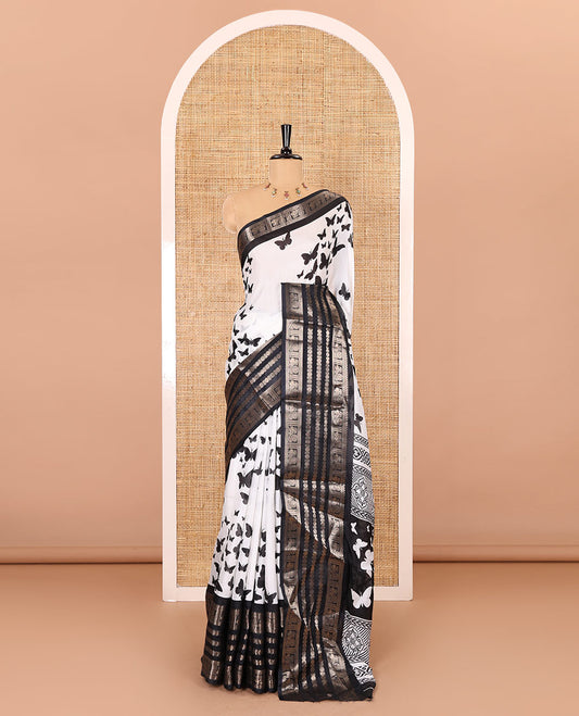 White and black butterflies printed dola silk saree, contrast traditional zari border, printed pallu, and a contrast plain blouse