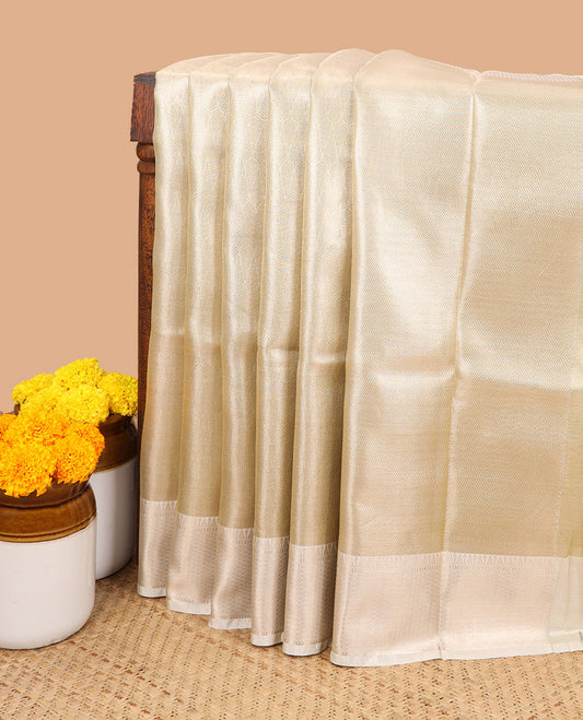 Gold with cream all-over brocade zari weaving design banaras kora tissue saree with contrast zari jacquard border & rich pallu along with brocade blouse