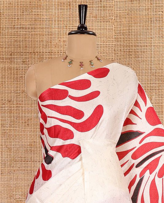 Borderless red fancy motifs batik-printed art khadi silk saree, contrast printed pallu, and a printed blouse