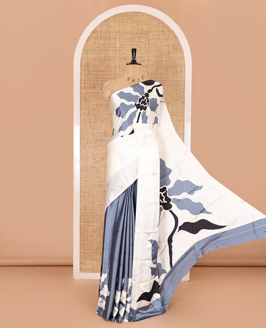 Borderless half-white-grey batik-style abstract floral printed gajji silk saree, batik abstract printed pallu, and a batik printed blouse