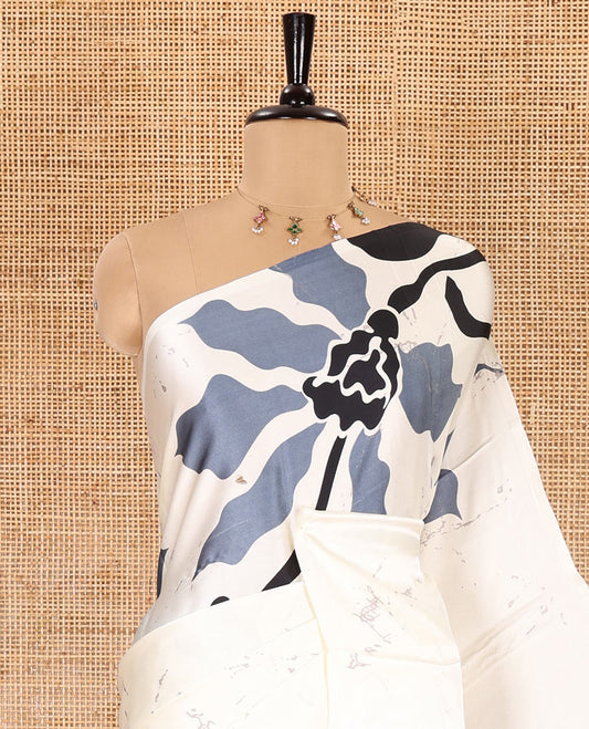 Borderless half-white-grey batik-style abstract floral printed gajji silk saree, batik abstract printed pallu, and a batik printed blouse