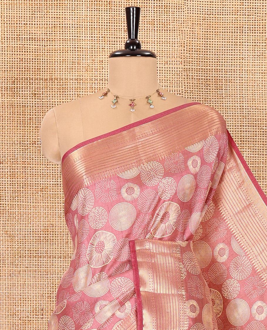 Dusty rose pink lotus-leaf style printed semi-tussar saree, traditional zari border, zari striped pallu, and a matching blouse