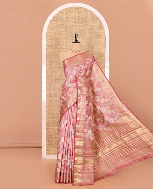 Dusty rose pink lotus-leaf style printed semi-tussar saree, traditional zari border, zari striped pallu, and a matching blouse