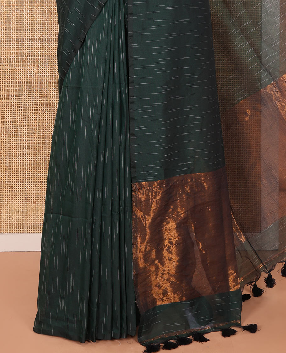 Borderless Green Khadi Mul Cotton Saree Decked with Jharna-Style Waterdrop Motifs, Featuring a Gleaming Zari-Woven Pallu, Paired with a Matching Blouse Replicating the Body Motifs