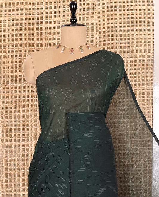 Borderless Green Khadi Mul Cotton Saree Decked with Jharna-Style Waterdrop Motifs, Featuring a Gleaming Zari-Woven Pallu, Paired with a Matching Blouse Replicating the Body Motifs