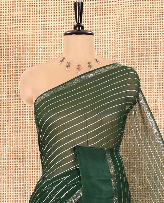 Green Viscose Georgette Saree Gleamed with Horizontal Golden Zari Stripes All Over Its Body,  by a Satin Plain Border, a Self Pallu Featuring the Same Horizontal Stripes, and Paired with a Running Blouse