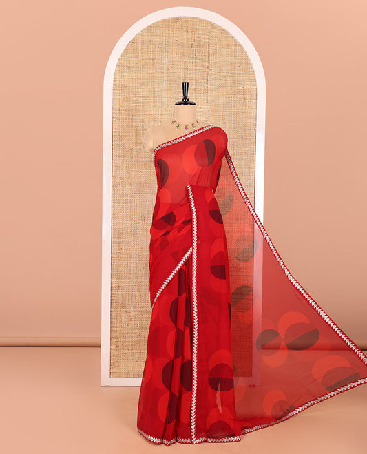 Red Georgette Saree Colorfully Printed with Leheriya-Style Stripes, Subtly Temple Motifs Sequin Embroidered Piping Border, and Paired with a Matching Diamond-Patterns Printed Blouse