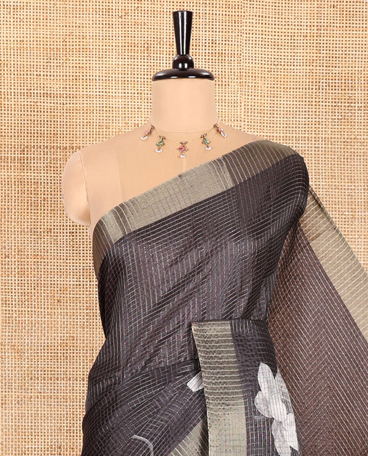 Black Semi Tussar Featuring Micro-Checks and Elegant Lotus Prints All Over Its Body, a Subtle Border, Pallu Mirrors Lotus Motifs, and Comes with a Matching Blouse