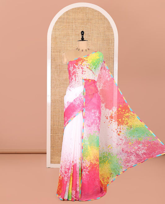 Cream Chiffon Saree, Colorfully Printed with Abstract Holi-Style Color Splashes Prints All Over Its Body, Thin Piping Border, Pallu Picturing the Same Print, and Paired with a Contrast Pink Blouse