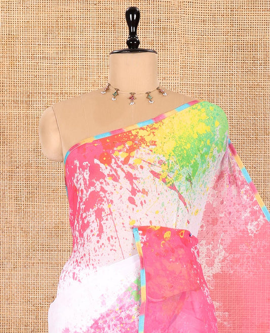 Cream Chiffon Saree, Colorfully Printed with Abstract Holi-Style Color Splashes Prints All Over Its Body, Thin Piping Border, Pallu Picturing the Same Print, and Paired with a Contrast Pink Blouse
