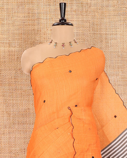 Orange Linen Cotton Saree, Subtly Sparkled with Mirror Work All Over Its Body, Subtly Scallop Border, Complemented by Contrast Pallu of Stripes and Mirror Work, and Paired with a Contrast Geometric Printed Blouse