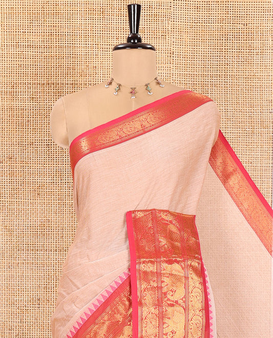 Light Beige Plain Chettinad Cotton Saree, Complemented by a Captivating Contrast Traditional Temple Border of Peacock-Elephant Designs, Subtly Striped Pallu, and Paired with a Matching Blouse