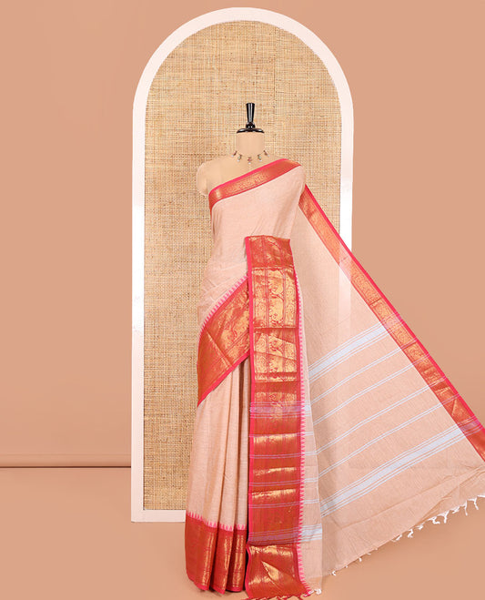 Light Beige Plain Chettinad Cotton Saree, Complemented by a Captivating Contrast Traditional Temple Border of Peacock-Elephant Designs, Subtly Striped Pallu, and Paired with a Matching Blouse