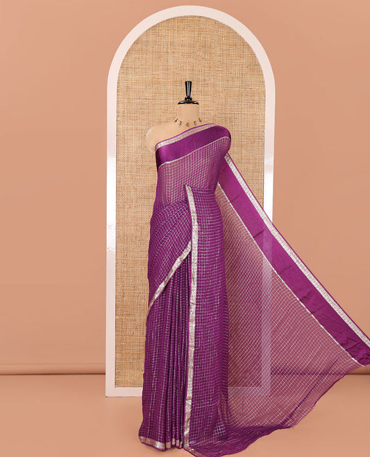 Scintillating Purple Viscose Georgette Saree Gleamed Up with Checked Design on Its Body, Highlighted by a Double-Pet Border, Zari Checked Design Pallu, and Paired with a Matching Blouse