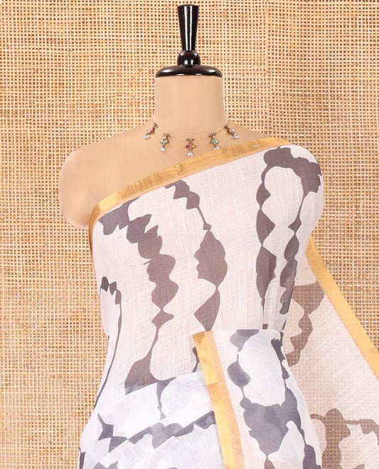 White-Grey Linen Cotton Saree, Accentuated with Shibori-Printed Body, Highlighted by Piping Border,  Floral Printed Pallu, and Contrast Blouse