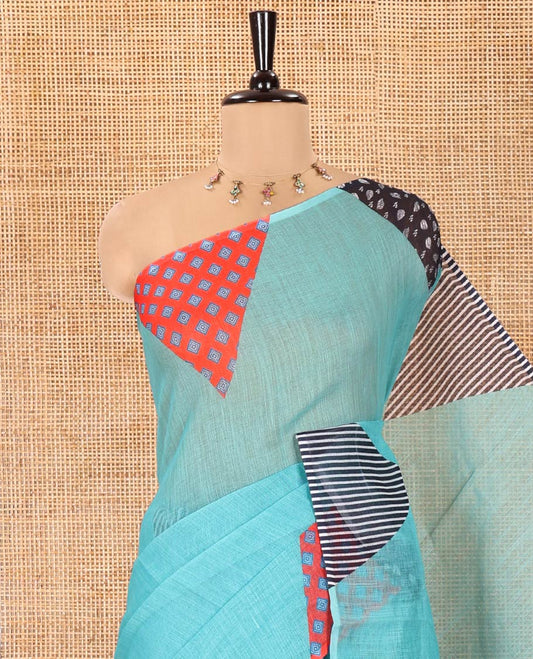 Blue Plain Linen Cotton Saree, Complemented by a Contrast-Colored Triangle on Its Border, Kaleidoscopic-Color Patchwork Pallu, and Paired with a Contrast Blouse