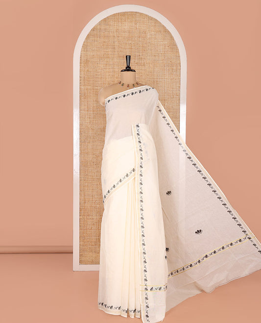 Cream Plain Kerala Cotton Saree, Subtly Printed With Floral Creeper Motifs Border, Floral Printed Pallu, and Paired with a Matching Blouse