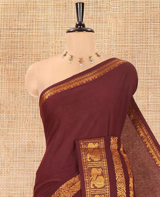 Coffee Brown Plain Sungudi Cotton Saree, Highlighted by Traditional Zari Border of Peacock and Floral Creeper Designs, Subtly Striped Pallu, and Paired with a Contrast Blouse