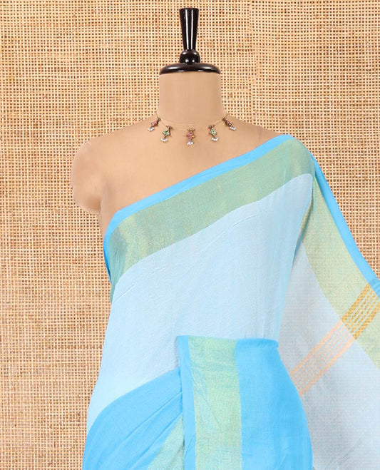Blue Khadi Mul Cotton Saree, Adorned with Half-And-Half-Style Double-Colour Dyed on Its Body, a Subtle Zari Border, Striped Pallu, and Paired with a Matching Blouse