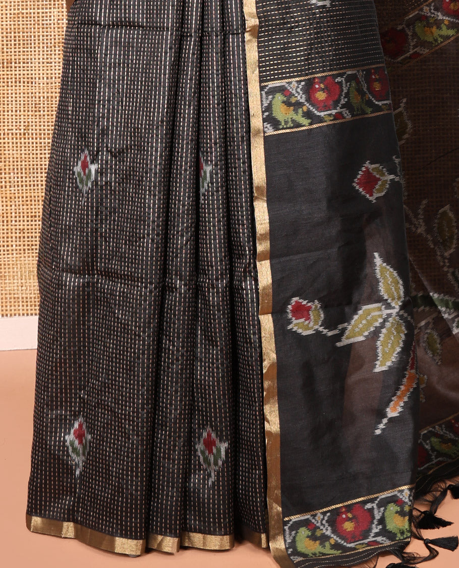 Black Art Tussar Saree, Bedecked with Dotted-Kantha-Style Stripes and Ikkat Buttas on Its Body, a Subtle Piping Border, Pallu of Ikkat Floral and Macaw Parrot Designs, and Paired with a Matching Blouse