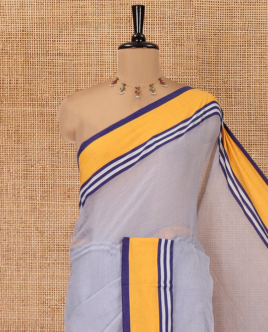 Grey Plain Khadi Mul Cotton Saree, Complemented by a Contrast Yellow Border, a Self-Pallu, and Has No Blouse