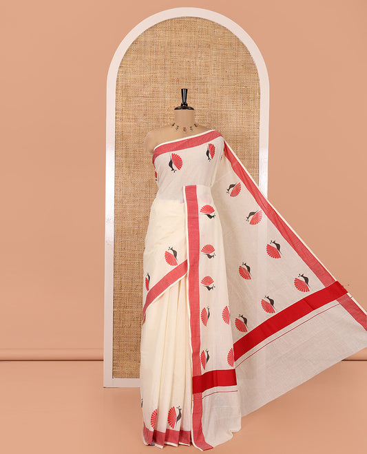 Cream Kerala Cotton Saree, Subtly Sparkled With Peacock Print, a Contrast Border, Pallu of Peacock Print and a Matching Blouse