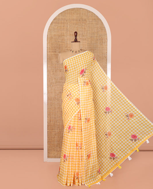 Yellow Linen Cotton Saree, Adorned with Checks and a Floral Print, Lace Border, a Self-Pallu, and a Contrast Blouse