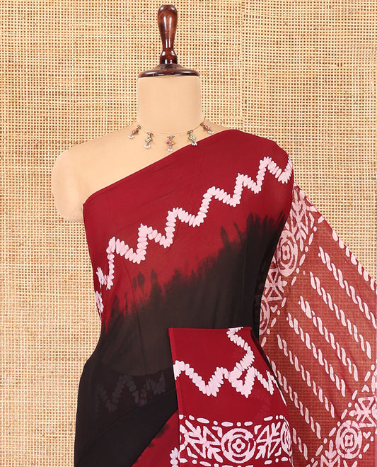 Black-Maroon Plain 60Gm Georgette Saree, Contrast Zig-Zag Batik Printed Border, Batik Printed Pallu, and a Matching Blouse
