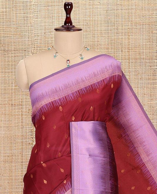 Maroon Art Kanchi Silk Saree, Adorned with Buttas, a Contrast Traditional Zari Border, Intricate Pallu, and a Contrast Blouse