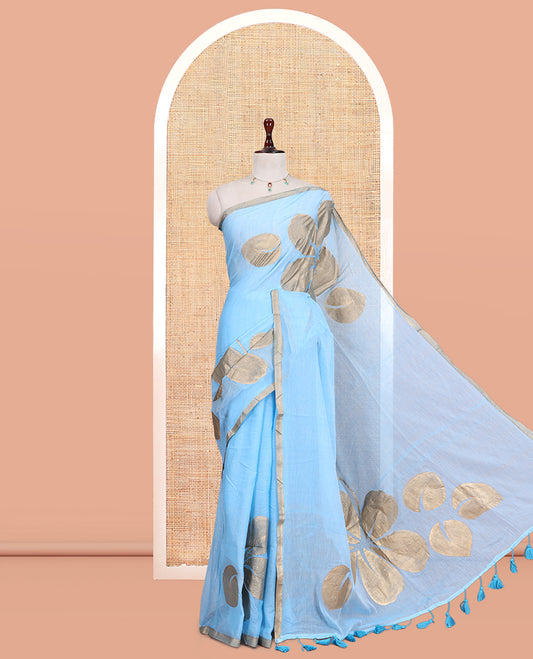Blue Khadi Mul Cotton Saree Features Floral Motifs Glitter-Print, a Piping Border, and a Matching Blouse