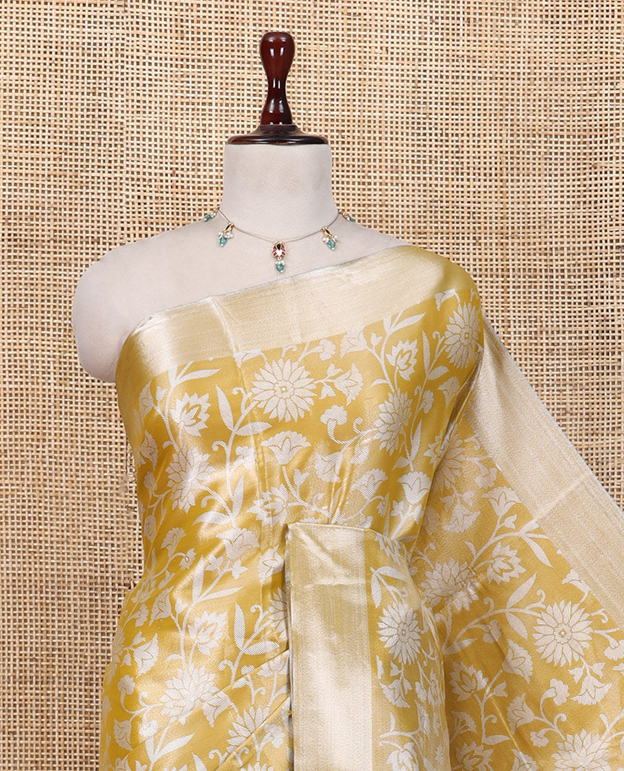 Yellow Tissue Cotton Saree Features Floral Vine Design, a Zari Border, Contrast Intricate Pallu, and a Contrast Blouse