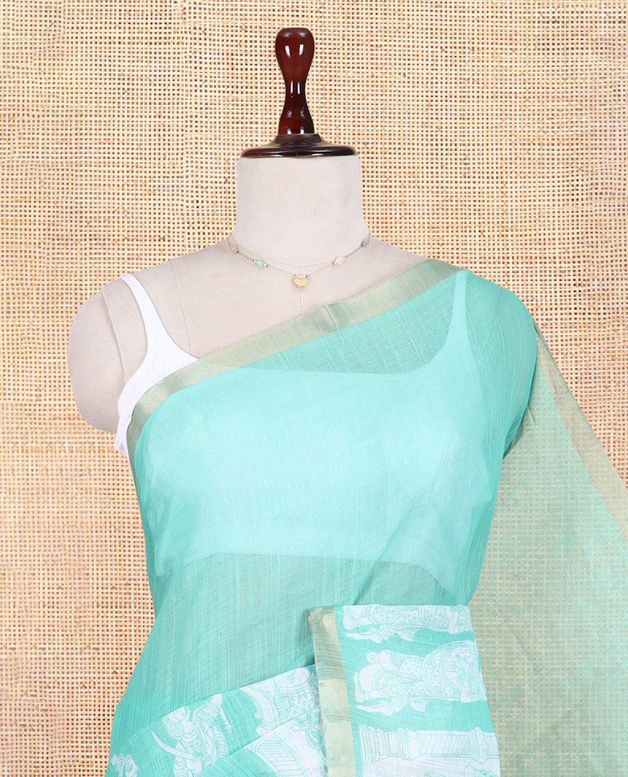 Sea Green Linen Cotton Saree Features Kalamkari Human Figurines, a Piping Border, Kalamkari Pallu, Contrast Blouse