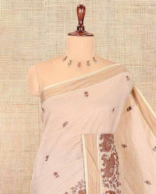 Cream Chanderi Cotton Saree Features Floral-Elephant Embroidery, a Contrast Border, and a Matching Blouse