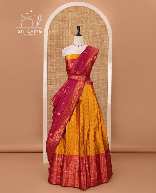 Mustard semi-banaras half-saree, embossed & contrast traditional zari border skirt,blouse of embossed & zari work & contrast-rani pink zari design dhavani