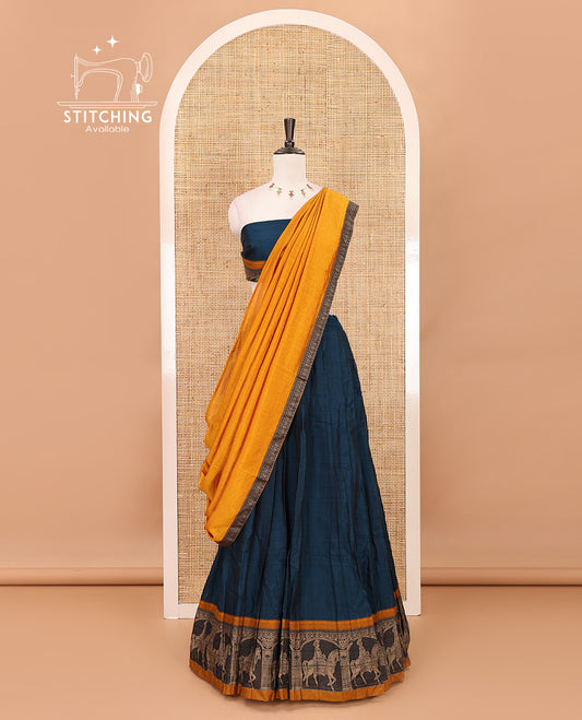 Blue with mustard mercedised cotton half-saree, contrast elephant zari border skirt, matching blouse & one side border georgette dhavani