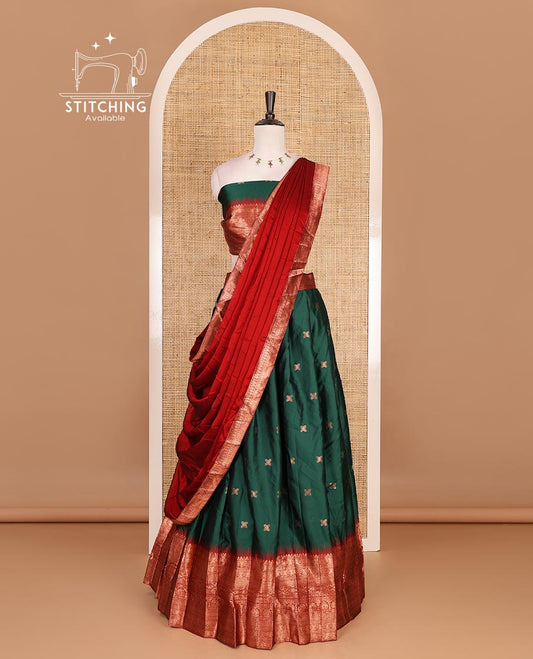 Green taffeta silk half saree, zari buttas with contrast maroon traditional zari border skirt, matching zari design blouse, and contrast plain zari border syska georgette dhavani