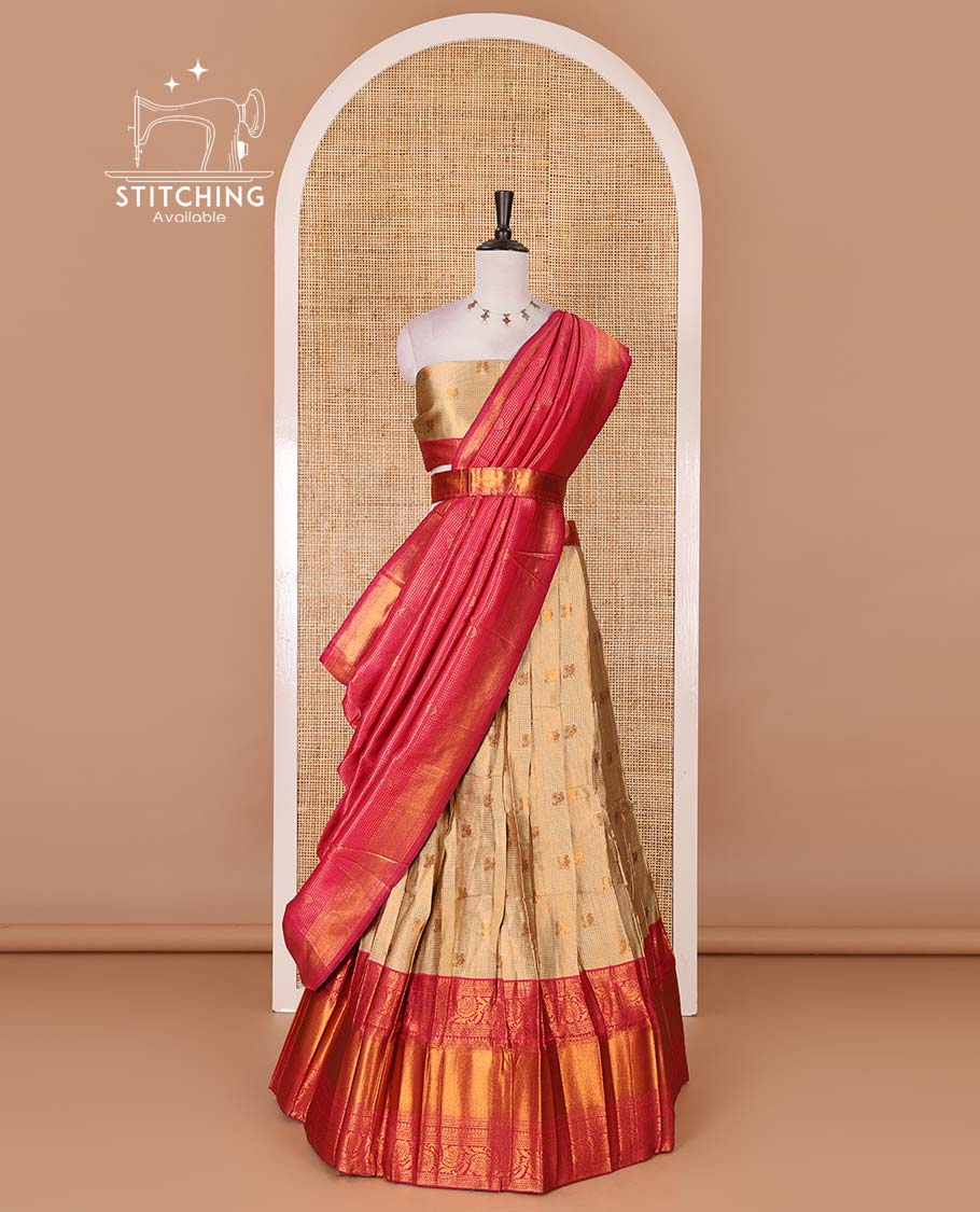 Gold banaras half saree, zari buttas with contrast rani pink traditional zari border skirt, matching blouse, dhavani of zari checks, and buttas